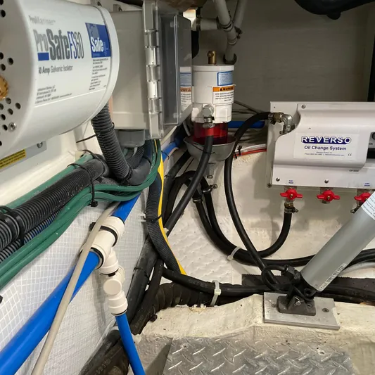  Yacht Photos Pics Engine room of 2016 Back Cove 30 boat with wiring and oil change system.