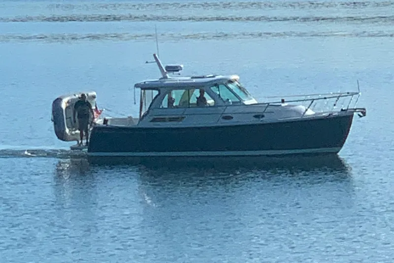  Yacht Photos Pics 2016 Back Cove 30 boat cruising on calm water.