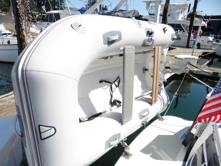  Yacht Photos Pics Inflatable dinghy mounted on a 2016 Back Cove 30 yacht at a marina.