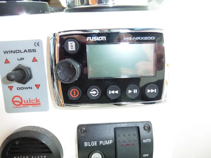  Yacht Photos Pics Control panel on a 2016 Back Cove 30 boat featuring Fusion MS-NRX200i and Quick windlass.