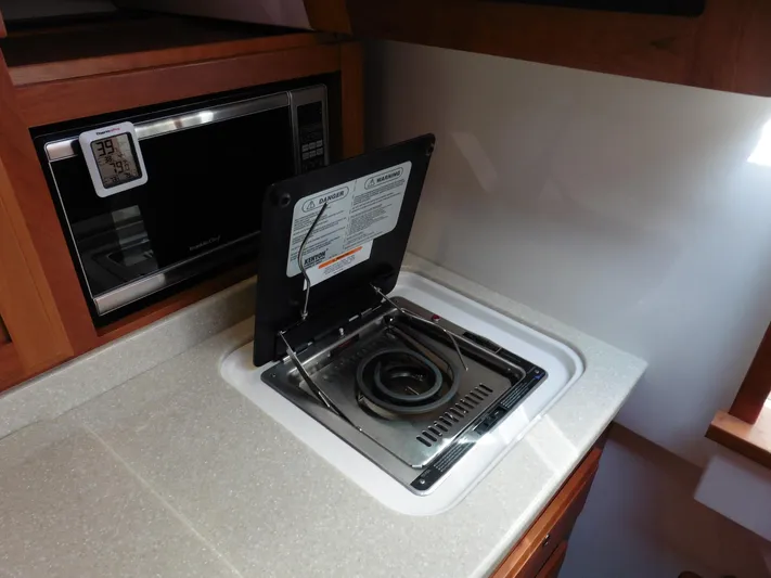  Yacht Photos Pics 2016 Back Cove 30 yacht kitchen with stove and microwave.