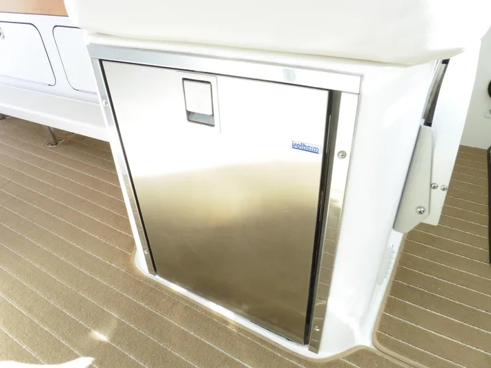  Yacht Photos Pics Stainless steel refrigerator on 2016 Back Cove 30 boat deck.