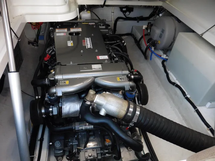  Yacht Photos Pics Engine compartment of a 2016 Back Cove 30 boat, showcasing detailed mechanical components.