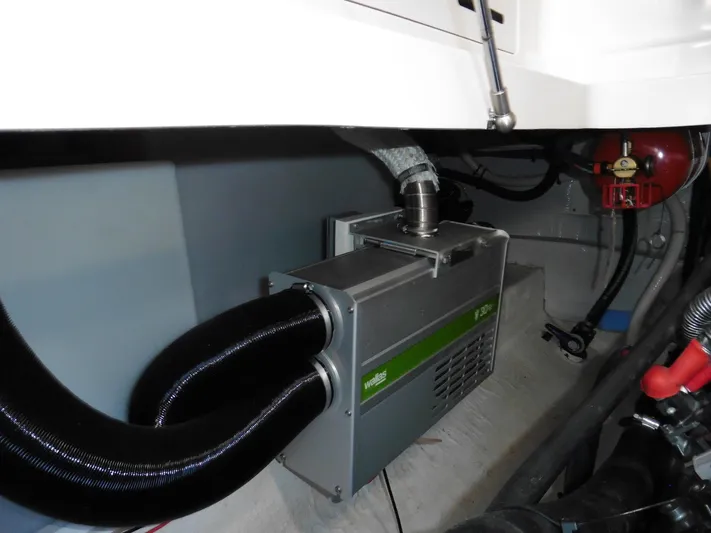  Yacht Photos Pics Engine compartment of a 2016 Back Cove 30 boat, featuring mechanical components and wiring.