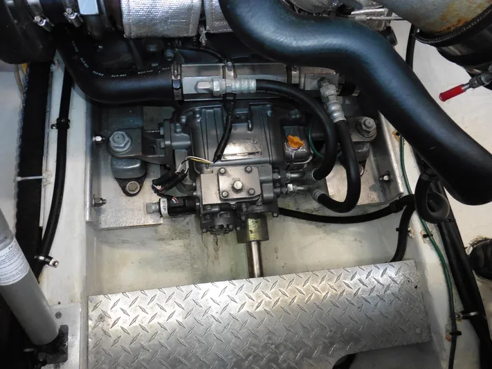  Yacht Photos Pics Engine compartment of a 2016 Back Cove 30 boat, featuring mechanical components and hoses.