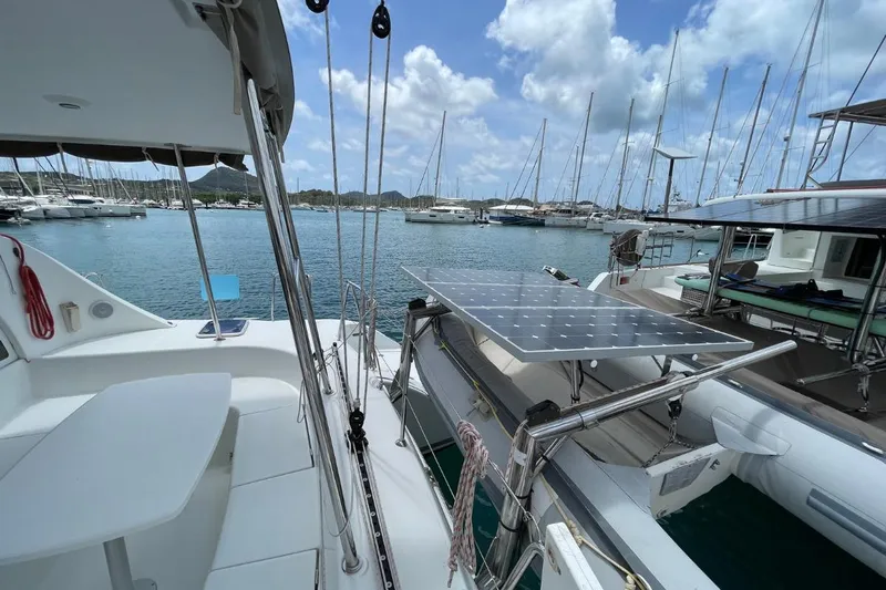 Carnabie Yacht Photos Pics Lagoon 380 S2 catamaran with solar panels docked in a marina, 2014 model.