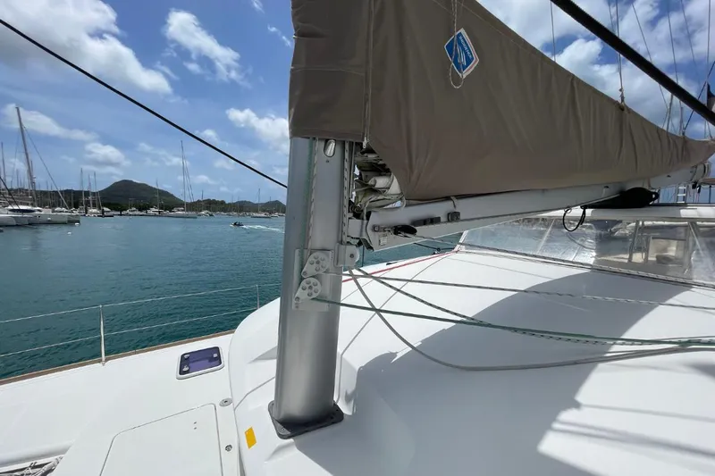 Carnabie Yacht Photos Pics Lagoon 380 S2 sailboat deck with mast, docked in a scenic marina, 2014 model.