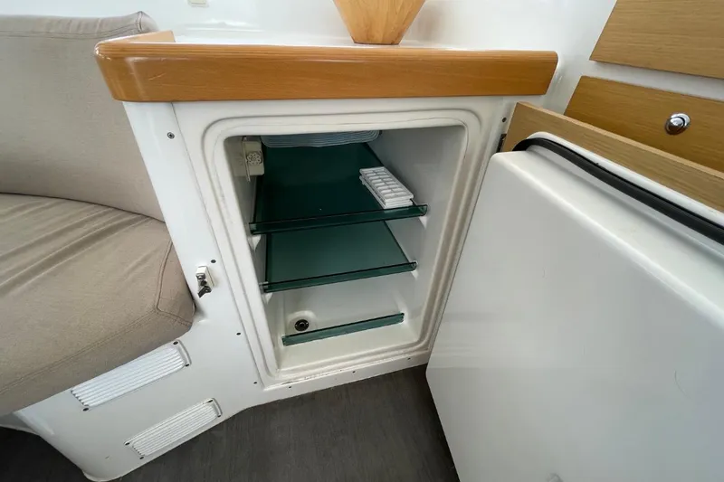 Carnabie Yacht Photos Pics Interior of a 2014 Lagoon 380 S2 yacht showing an open mini fridge.