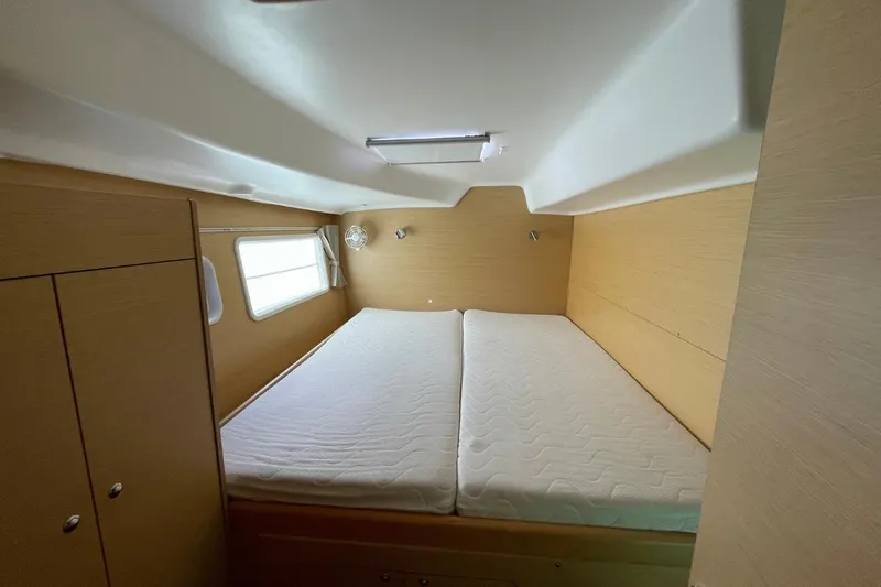 Carnabie Yacht Photos Pics 2014 Lagoon 380 S2 cabin interior with double bed and wooden finish.