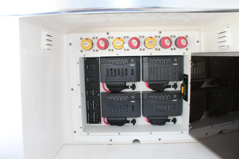  Yacht Photos Pics Electrical panel of 2016 Edgewater 370CC boat with circuit breakers and switches.