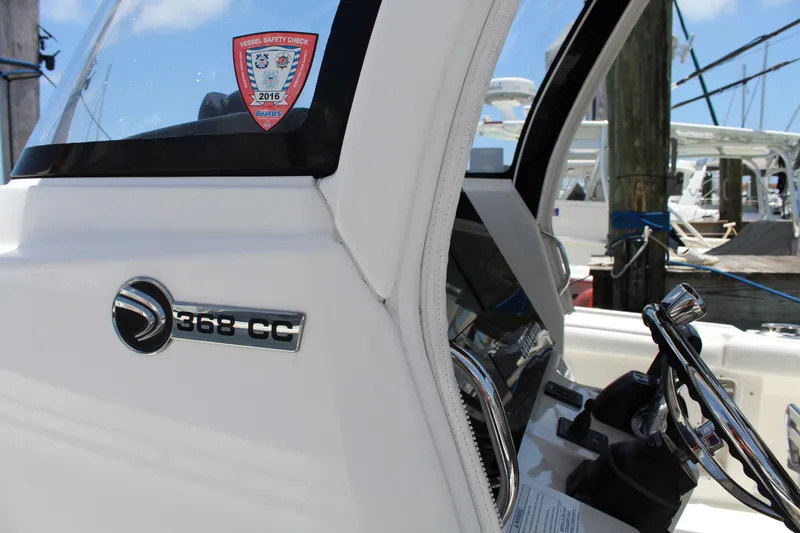  Yacht Photos Pics Edgewater 370CC boat interior with 2016 vessel safety check sticker.