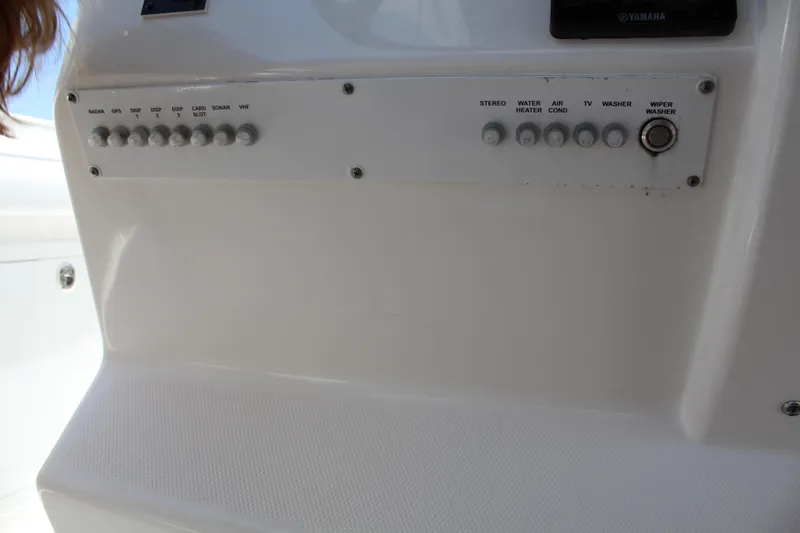  Yacht Photos Pics Control panel of a 2016 Edgewater 370CC boat with labeled switches.