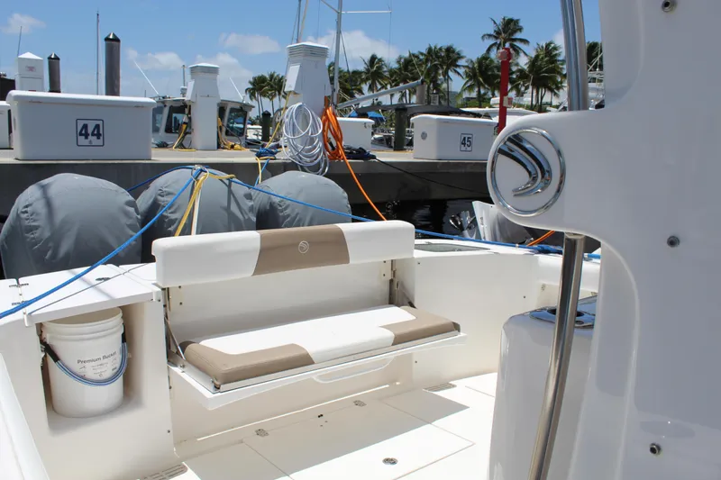  Yacht Photos Pics 2016 Edgewater 370CC boat interior with seating, docked at marina.