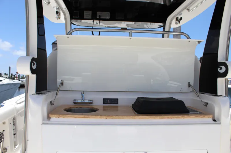  Yacht Photos Pics 2016 Edgewater 370CC boat interior with sink and counter setup.