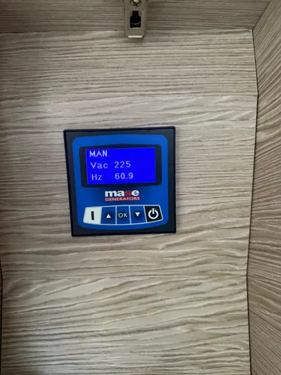  Yacht Photos Pics Control panel of Mase Generators in 2023 Rio Yachts SPORT COUPE, displaying voltage and frequency.