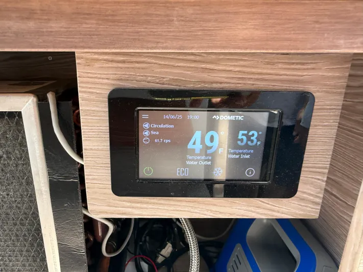  Yacht Photos Pics Control panel on 2023 Rio Yachts SPORT COUPE displaying water temperatures and settings.
