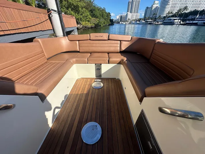  Yacht Photos Pics Interior of a 2015 Chris-Craft Launch 32 with brown leather seating.