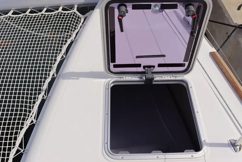 Libertas Ds Yacht Photos Pics Open hatch on 2019 Lagoon 450 F catamaran deck with netting.
