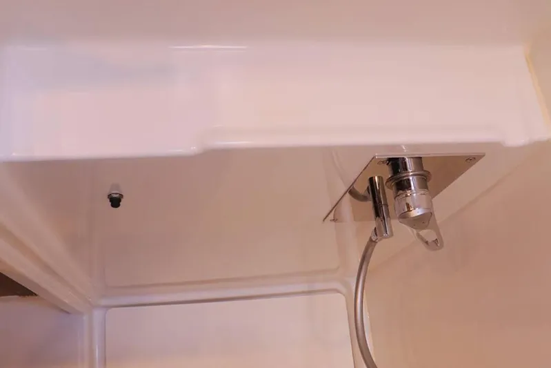 Libertas Ds Yacht Photos Pics Interior shower detail of 2019 Lagoon 450 F catamaran, featuring modern fixtures.