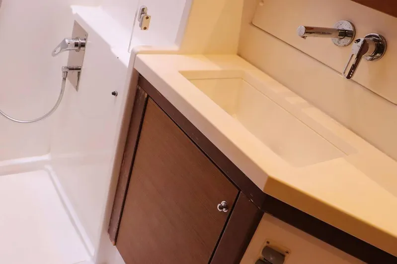 Libertas Ds Yacht Photos Pics 2019 Lagoon 450 F yacht bathroom with modern sink and shower fixtures.
