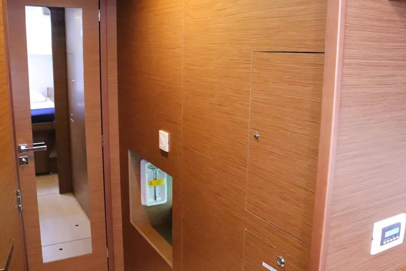 Libertas Ds Yacht Photos Pics Interior of 2019 Lagoon 450 F yacht, featuring wooden paneling and modern design elements.
