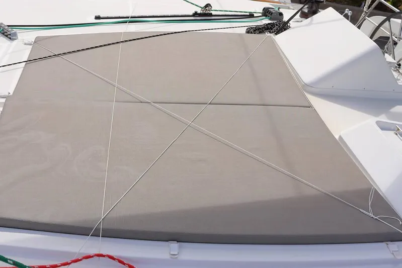 Libertas Ds Yacht Photos Pics Sunbathing area on 2019 Lagoon 450 F catamaran deck with ropes and cushions.