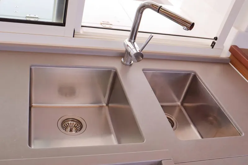 Libertas Ds Yacht Photos Pics Stainless steel double sink with modern faucet on Lagoon 450 F, 2019 model.