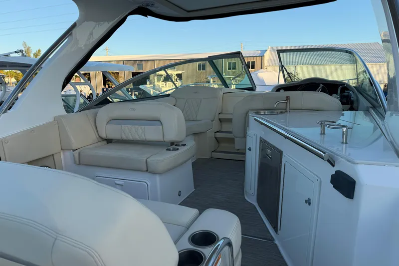  Yacht Photos Pics 2019 Regal 33 OBX boat interior with luxurious seating and modern amenities.