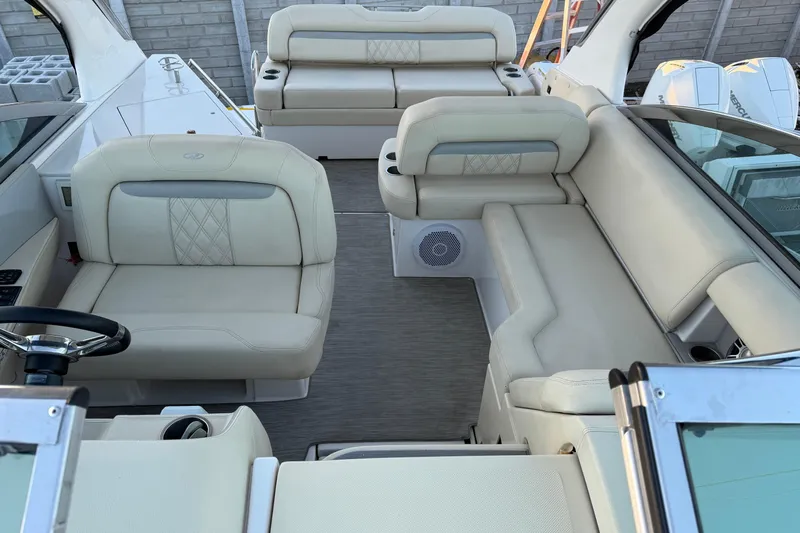  Yacht Photos Pics 2019 Regal 33 OBX boat interior with luxurious beige seating and modern design.