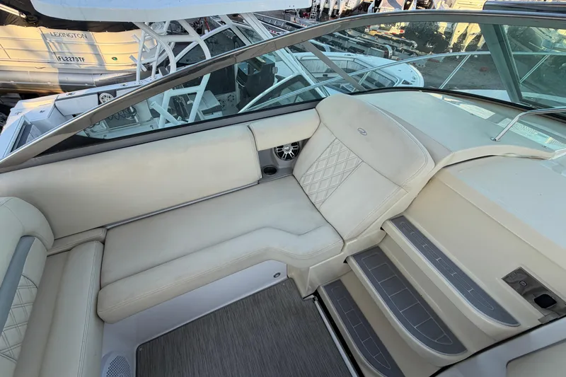  Yacht Photos Pics Luxurious interior seating of a 2019 Regal 33 OBX boat with elegant upholstery.