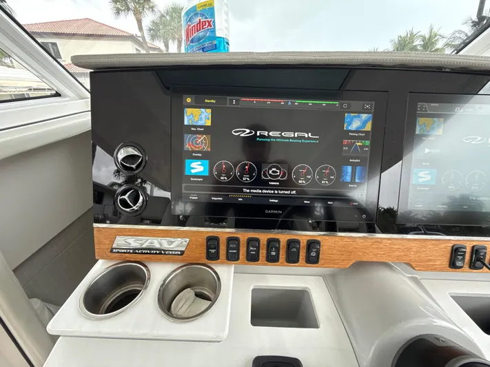  Yacht Photos Pics 2021 Regal 38 SAV dashboard with digital display and controls.