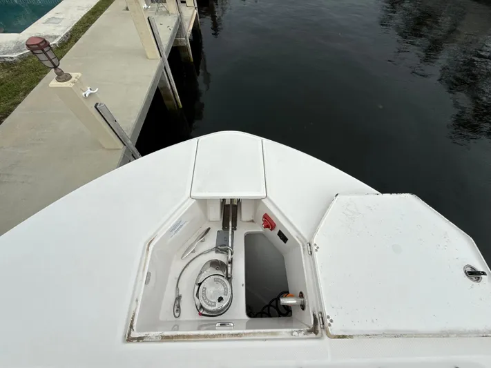  Yacht Photos Pics Bow of 2021 Regal 38 SAV boat with anchor compartment open.