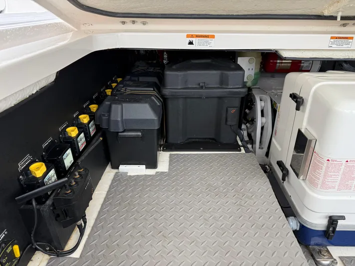  Yacht Photos Pics Engine compartment of 2021 Regal 38 SAV boat with batteries and equipment.