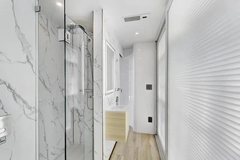  Yacht Photos Pics Modern bathroom interior in 2024 ARKUP 50 Liveable Yacht with marble and wood accents.