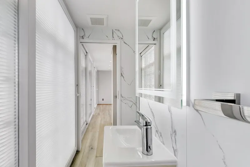  Yacht Photos Pics Modern bathroom interior on 2024 ARKUP 50 Liveable Yacht, featuring sleek design and marble accents.