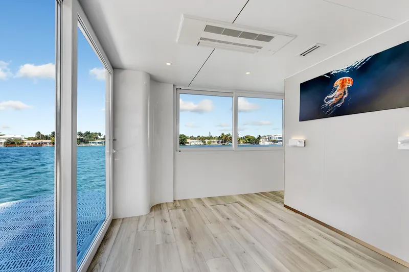  Yacht Photos Pics Interior of 2024 ARKUP 50 Liveable Yacht with ocean view and modern decor.