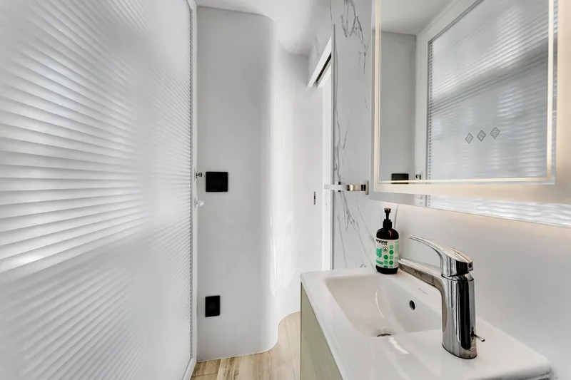  Yacht Photos Pics Modern bathroom interior on 2024 ARKUP 50 Liveable Yacht, featuring sleek design and elegant fixtures.