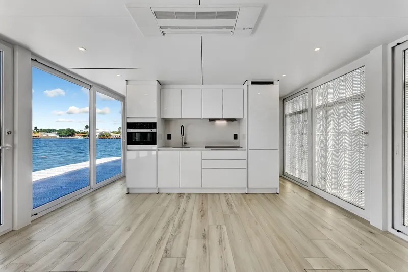  Yacht Photos Pics Modern kitchen interior on ARKUP 50 Liveable Yacht, 2024, with waterfront views and sleek design.