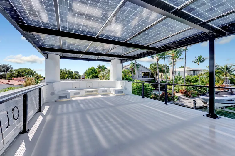  Yacht Photos Pics Rooftop deck of 2024 ARKUP 50 Liveable Yacht with solar panels and scenic view.