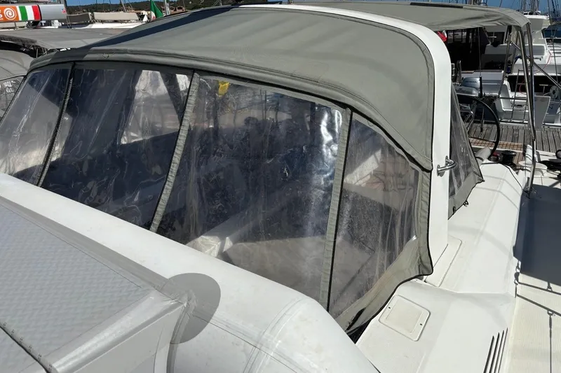  Yacht Photos Pics 2019 Beneteau Oceanis 51.1 sailboat with protective canopy and clear windows.