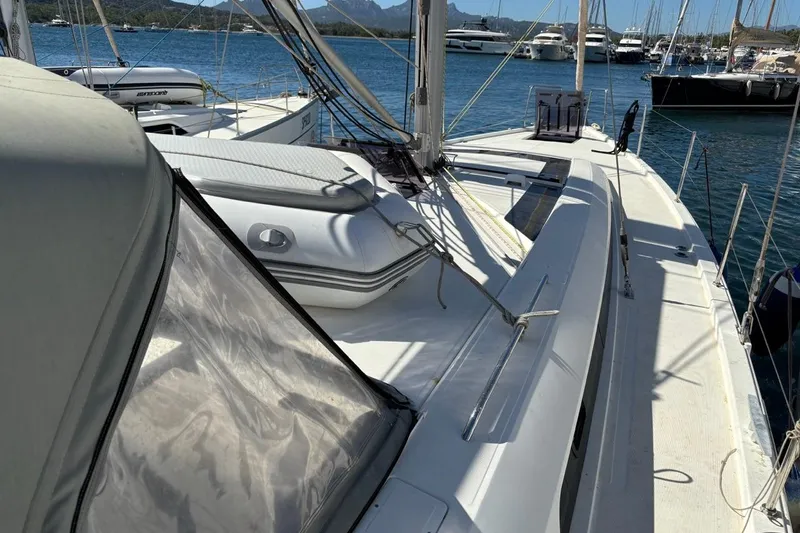  Yacht Photos Pics 2019 Beneteau Oceanis 51.1 sailboat deck with marina view.
