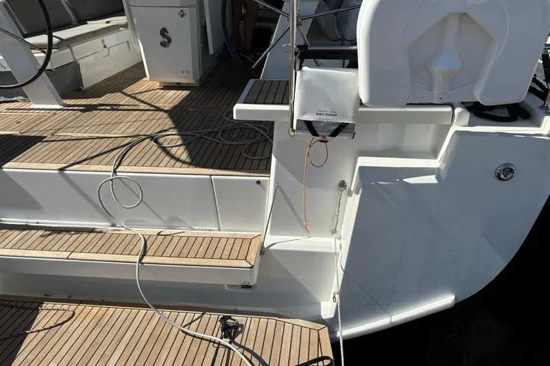  Yacht Photos Pics 2019 Beneteau Oceanis 51.1 yacht deck with teak flooring and seating area.