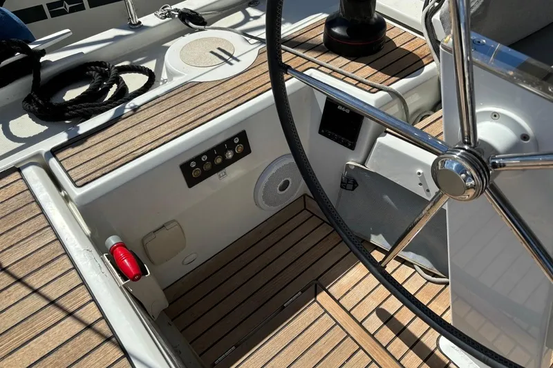  Yacht Photos Pics Cockpit of 2019 Beneteau Oceanis 51.1 sailboat with steering wheel and control panel.
