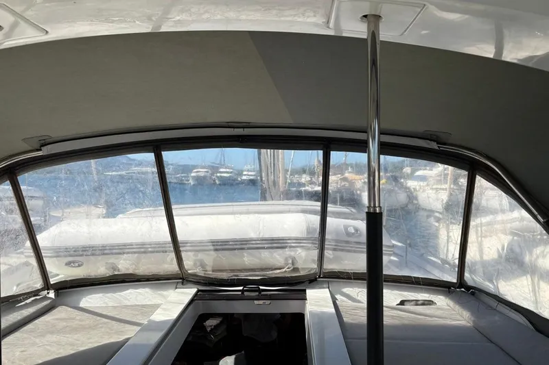  Yacht Photos Pics Interior view of 2019 Beneteau Oceanis 51.1 yacht with marina backdrop.