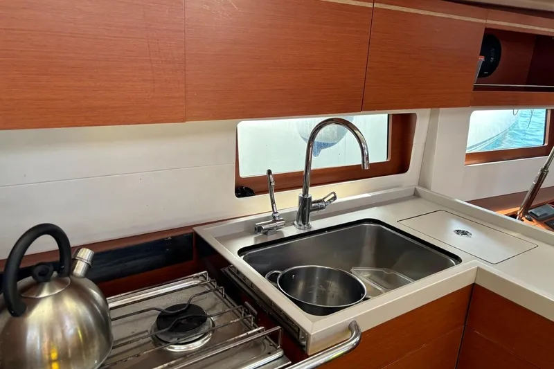  Yacht Photos Pics Modern kitchen in 2019 Beneteau Oceanis 51.1 yacht with sink and stove.