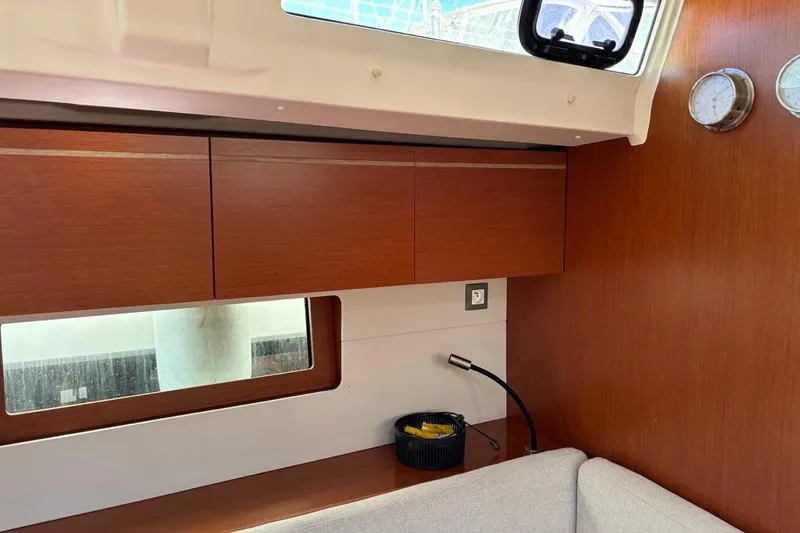  Yacht Photos Pics Interior of 2019 Beneteau Oceanis 51.1 yacht with wooden cabinets and modern design.