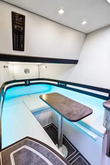  Yacht Photos Pics Interior of 2026 Mystic Powerboats M4200 with modern seating and ambient lighting.
