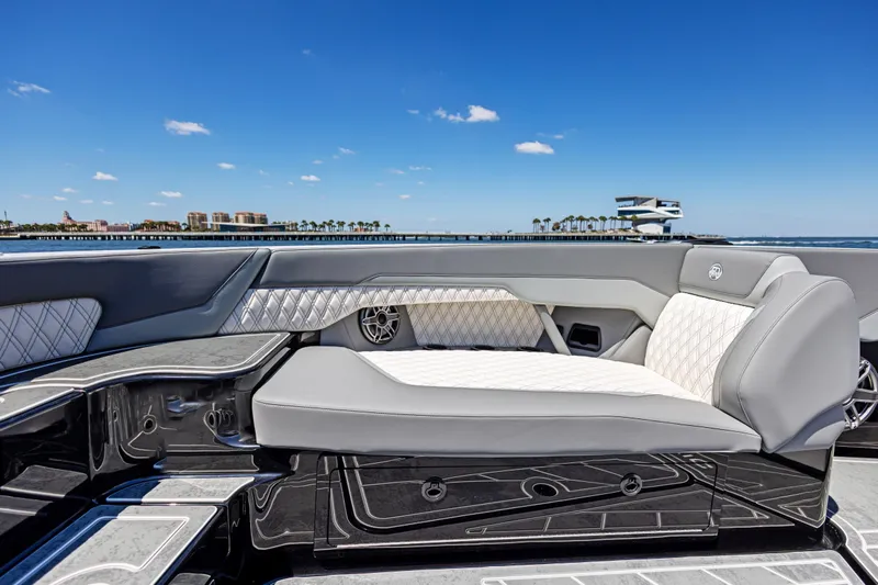 Yacht Photos Pics Luxurious seating on 2026 Mystic Powerboats M4200, with ocean view and clear blue sky.