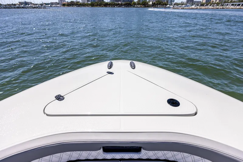  Yacht Photos Pics Bow view of 2026 Mystic Powerboats M4200 on water, showcasing sleek design.