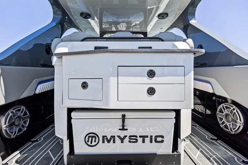 Yacht Photos Pics 2026 Mystic Powerboats M4200 interior with sleek cabinetry and modern design elements.